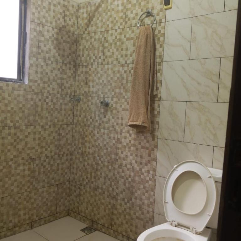 habitación cómoda con baño en suite y servicio de taxi - One-Bedroom Apartment - 9