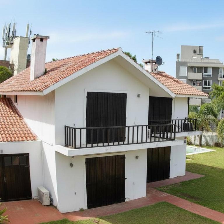 House steps from Playa Mansa with pool - Vacation Home - 1