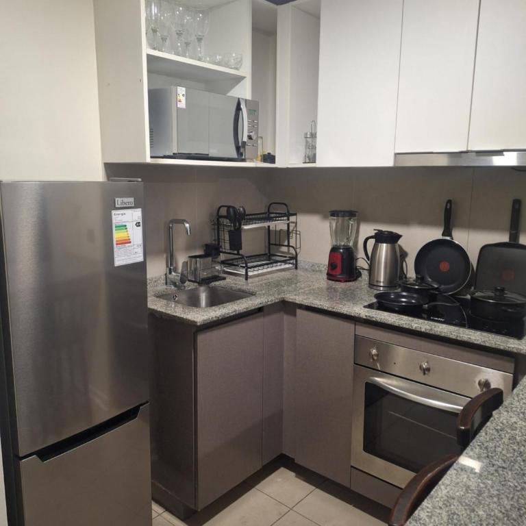 Full Departamento Céntrico a pasos del Metro Ecuador, Teletón, Mutual, Clinicas - Two-Bedroom Apartment - 4