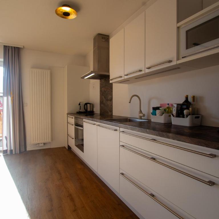Panorama Apartments - Steinbock Lodges - Großes Apartment mit 1 Schlafzimmer und Seeblick - 6