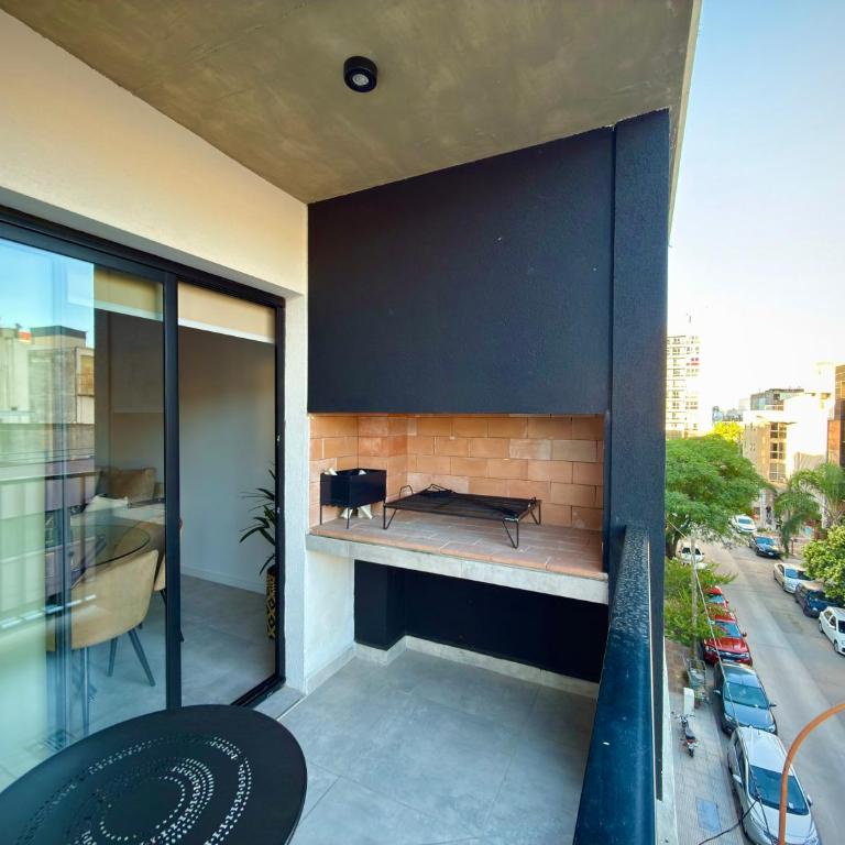 Departamento moderno pleno centro con pileta y cochera privada - Apartamento de 1 dormitorio - 12
