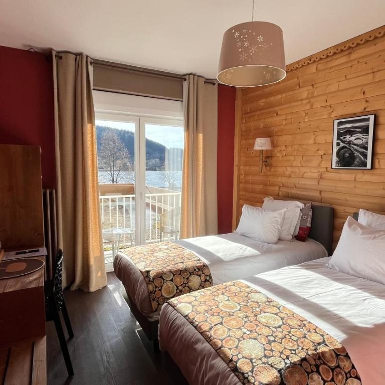 Annexe by Hôtel La Réserve - Chambre Lits Jumeaux - Vue sur Lac - 1
