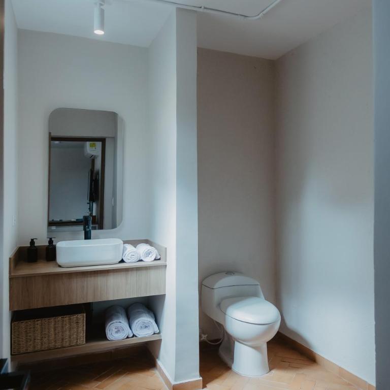 Pranik Living - Habitación Deluxe - 6