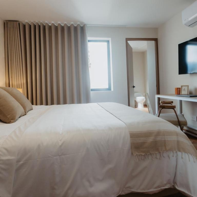 Pranik Living - Habitación Deluxe - 10