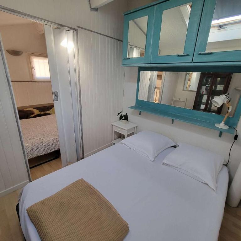 Jolie Maison d'angle rénovée , 5 personnes, séjour climatisé, résidence avec piscine commune , à 400 m de la plage de PORTIRAGNES LRJP132 - Maison de Vacances 3 Chambres - 11