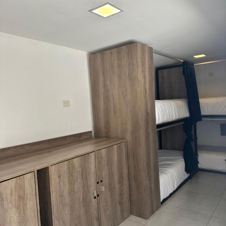 Dormís Acá - Cama en habitación compartida mixta de 4 camas - 5