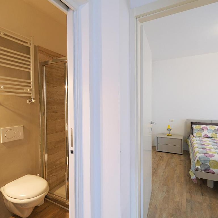 Moderno trilocale con doppi servizi Piazza Marconi - Appartamento con 2 Camere da Letto - 16