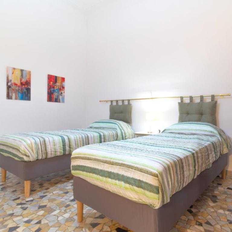 Domus Mazzini Pisa Centro - 6 Ospiti, 2 Bagni, 3 Camere, Patio Privato - 5 minuti dalla Stazione Treni - Appartamento con 3 Camere da Letto - 27