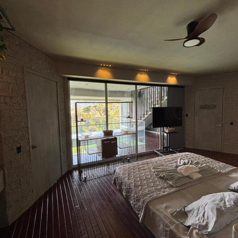 Habitación en Guatape Deluxe Standard Suite - Apartamento de 1 dormitorio - 5