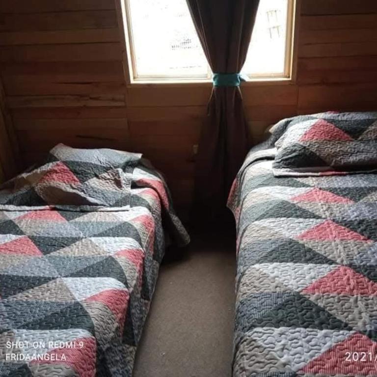 Hospedaje Familiar Refugio Coihuin - Habitación Doble - 1