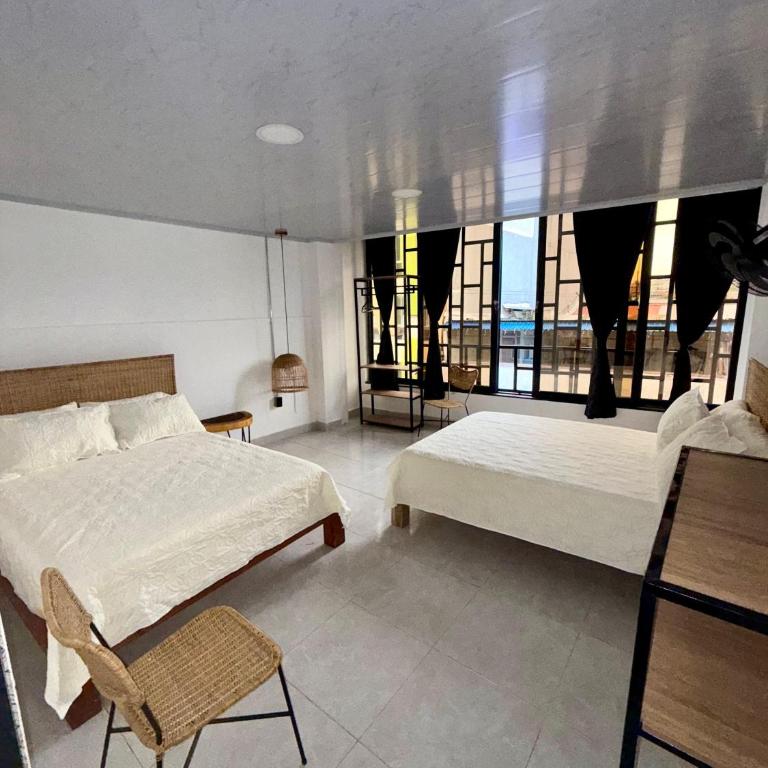 Hotel TOBA Boutique - Habitación Doble con baño privado - 2 camas - 4