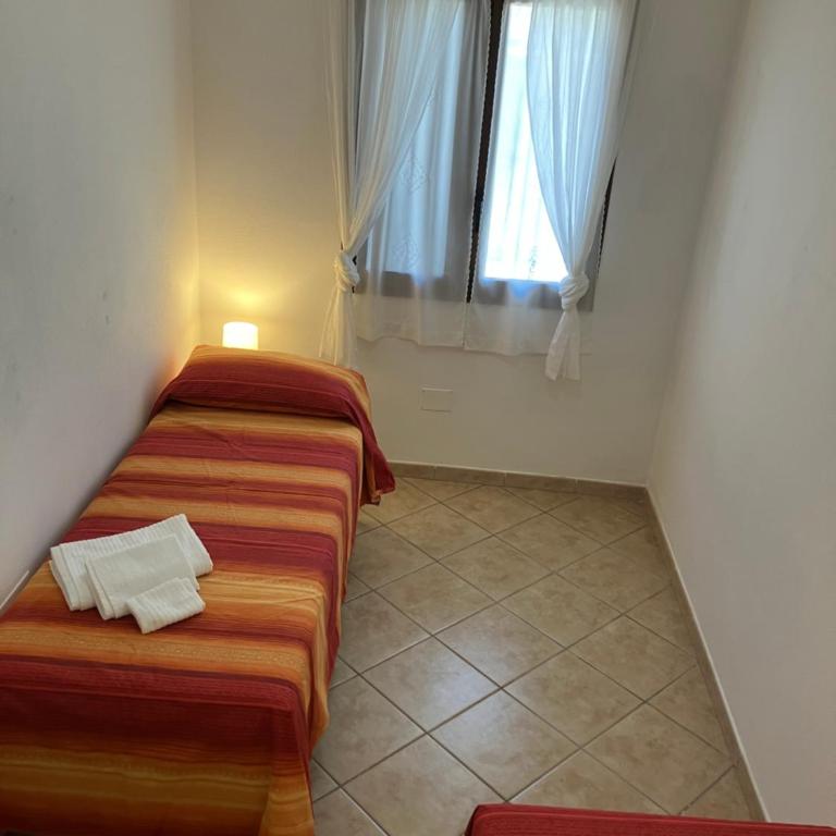 Casa Melis - Appartamento con 2 Camere da Letto e Vista Giardino - 9