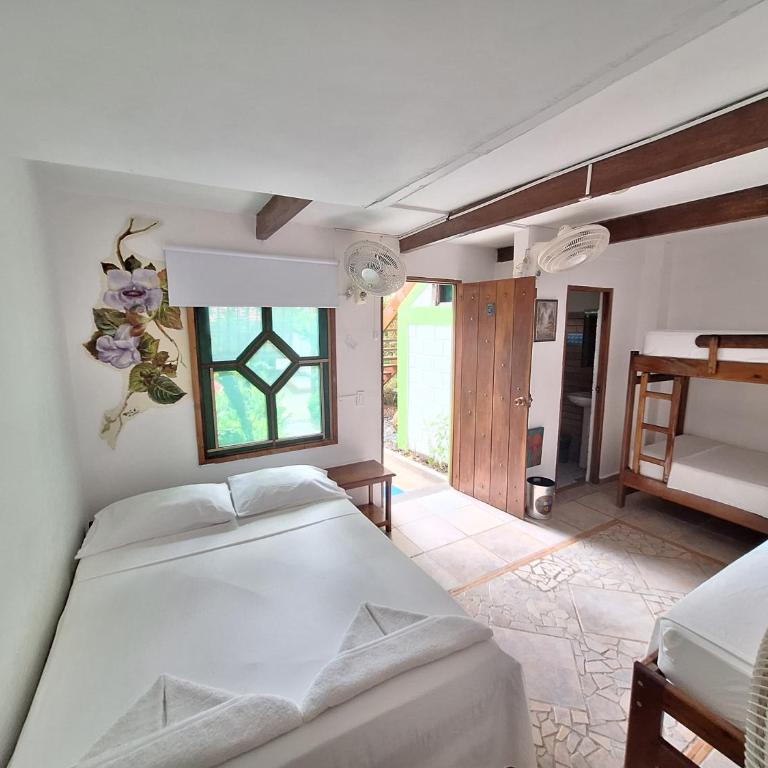 Hostal Capurgana - Habitación Doble - 1 o 2 camas - 3