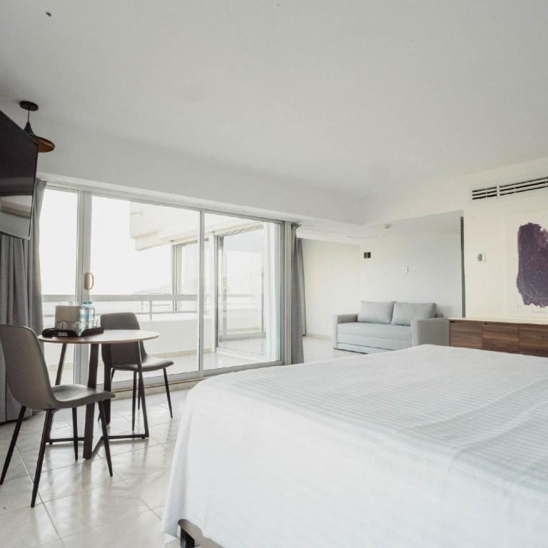 HS HOTSSON Hotel Acapulco - Habitación con cama extragrande y vistas al mar - 2