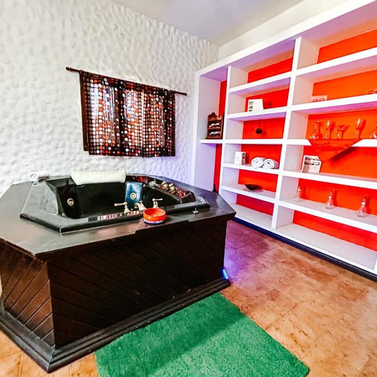 El Aura l Complejo de apartamentos amoblados - Suite con bañera de hidromasaje y cama grande - 9