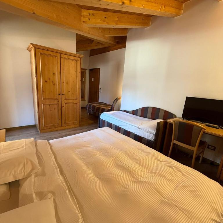 Hotel Villa Fosine Spa & Wellness - Camera Tripla Deluxe - 3