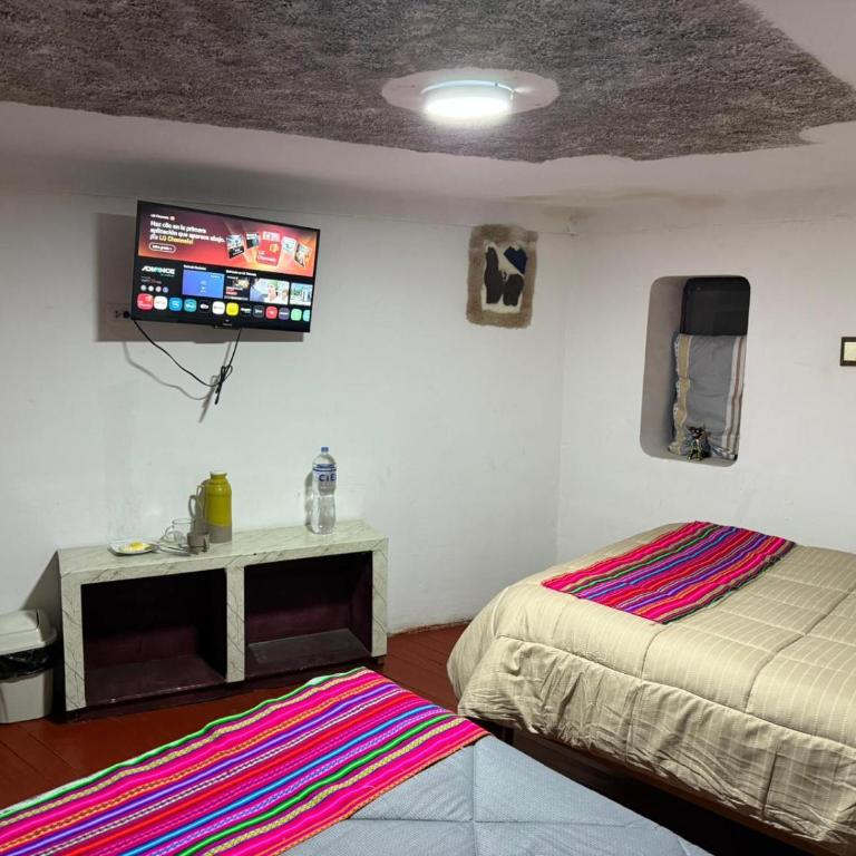 QOLLA WASI - Santa Ana - Cama individual en dormitorio mixto - 1