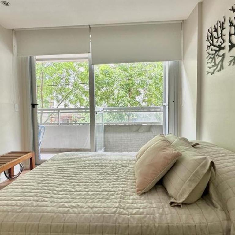 Check and Home - Sarmiento - Moderno con Pileta y Cochera - One-Bedroom Apartment with Balcony - 1