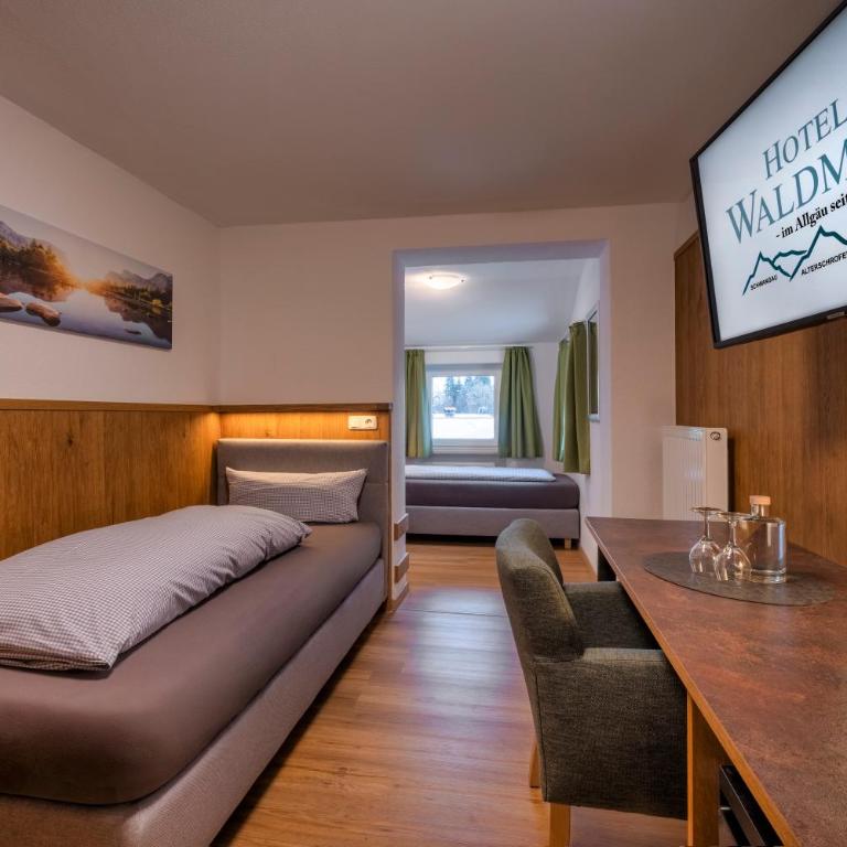 Hotel Waldmann - Zweibettzimmer mit Gartenblick - 4