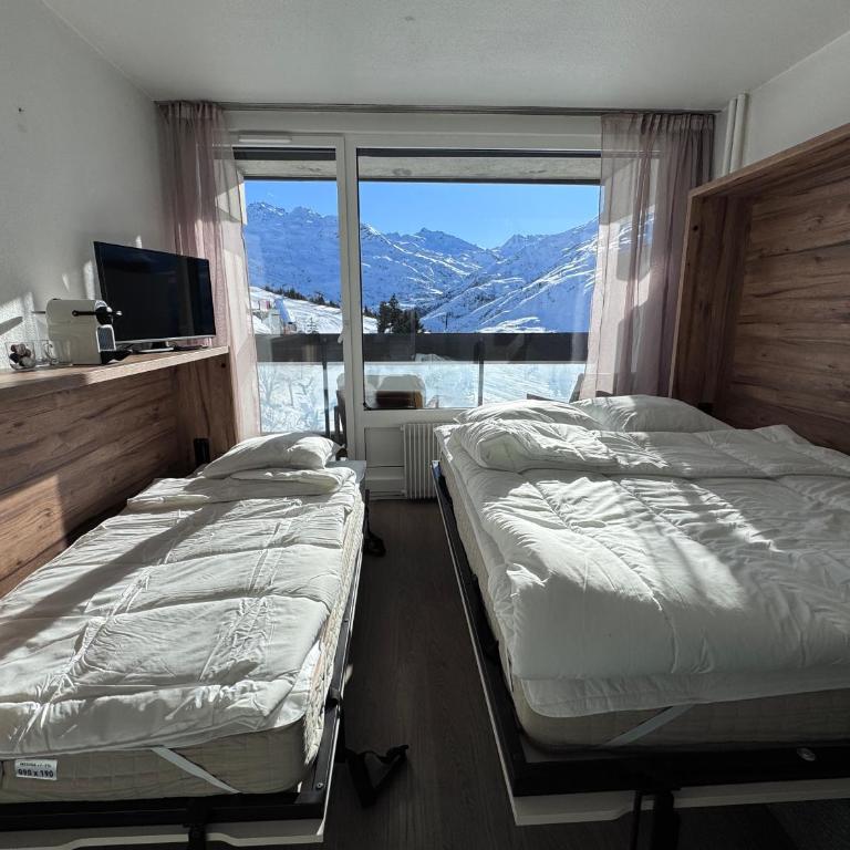 Dorons Mountain Studios, ski-in ski-out, au coeur des Menuires - Monolocale Deluxe - 11