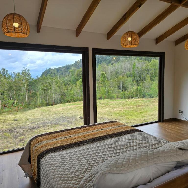HOM I Cabaña La Ensenada vista parcial al Volcán - Vacation Home - 25