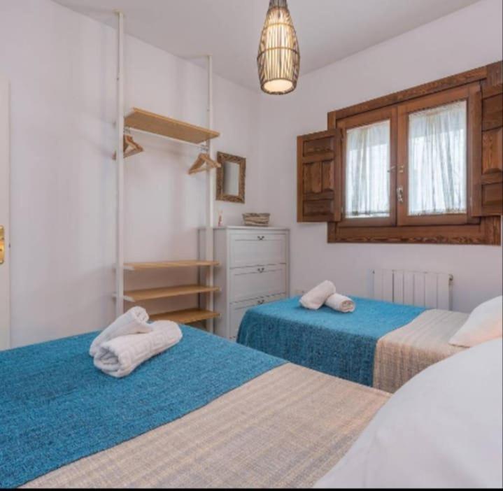 La casa de Lucy - Two-Bedroom Apartment with Balcony - 5