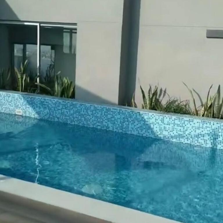 cozy apartment with swimming pool parking includ - Three-Bedroom Apartment - 12