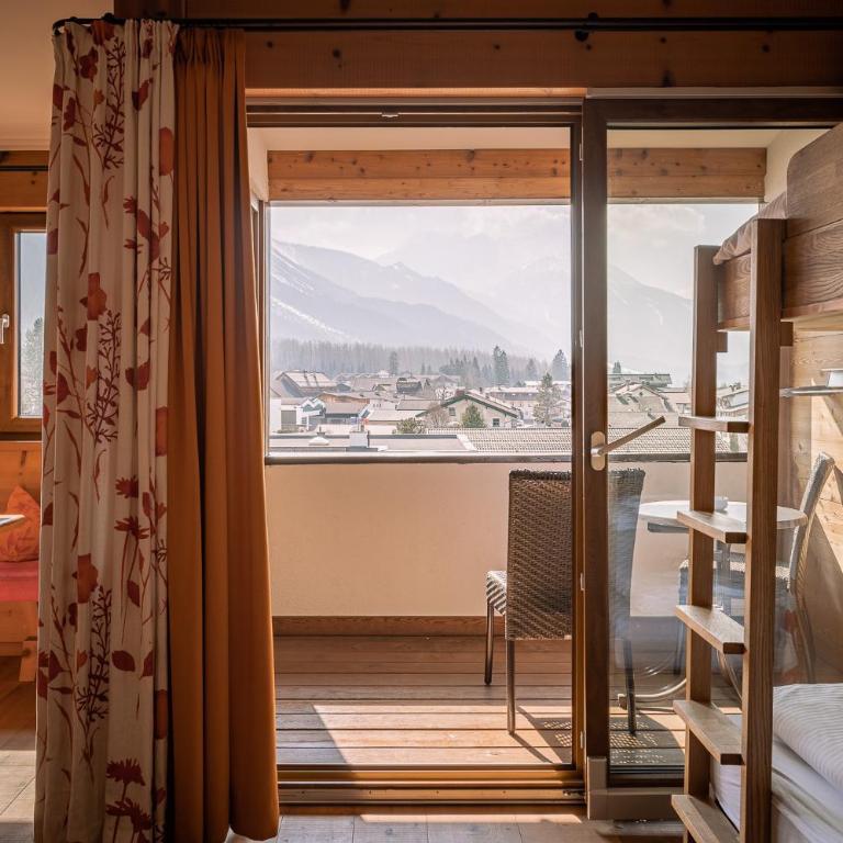 Hotel Tirolerhof - Familotel Zugspitze - Suite mit Bergblick - 2