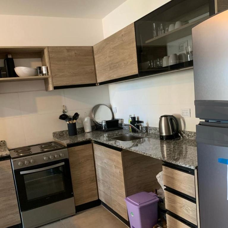 Departamento en el centro de Carlos Paz con pileta - Apartamento de 2 dormitorios - 12