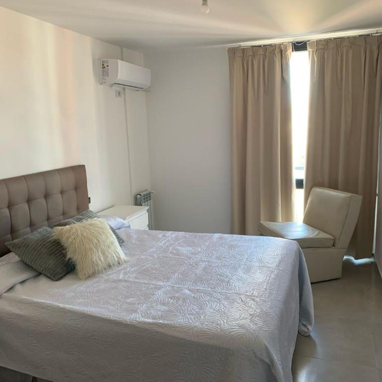 Departamento en el centro de Carlos Paz con pileta - Apartamento de 2 dormitorios - 23