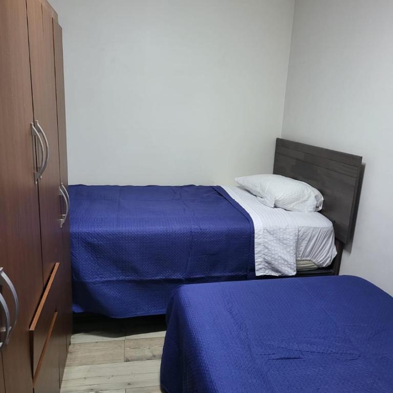departamentos a pasos de mall portal y casino - Twin Room - 1