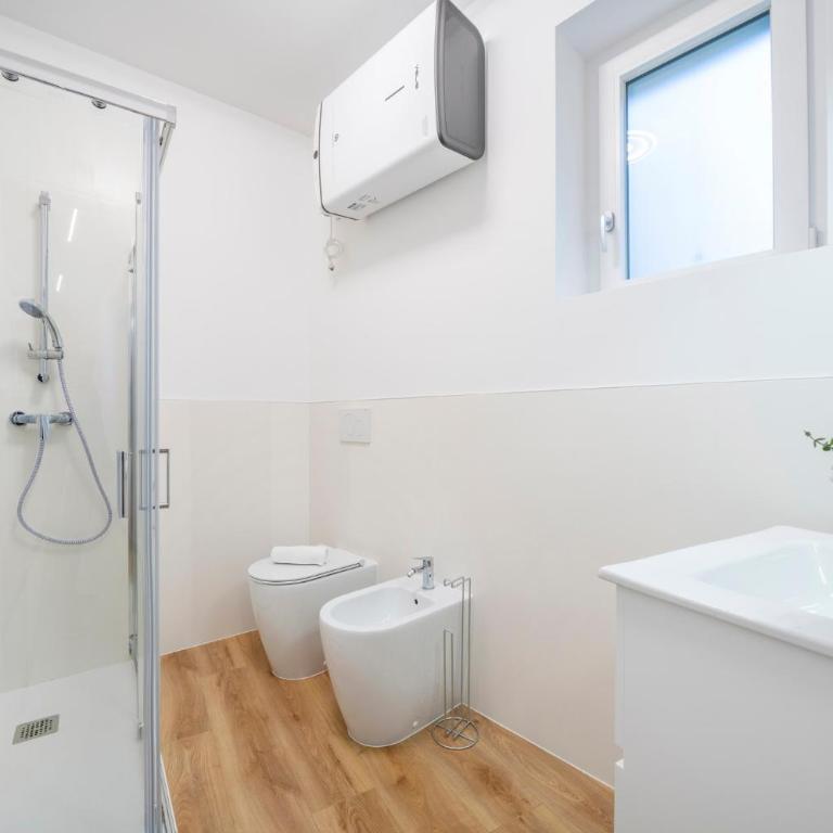 GuestHost - La Corte Del Pozzo Apartments - Appartamento Deluxe con 2 Camere da Letto - 5