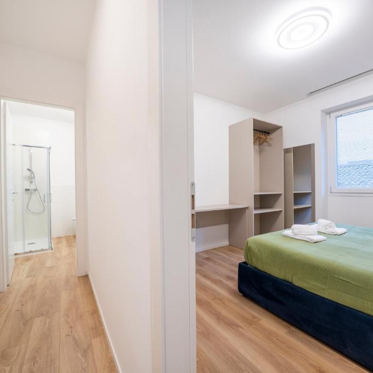GuestHost - La Corte Del Pozzo Apartments - Appartamento Deluxe con 2 Camere da Letto - 10