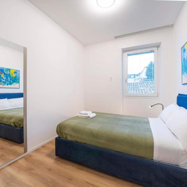 GuestHost - La Corte Del Pozzo Apartments - Appartamento Deluxe con 2 Camere da Letto - 11