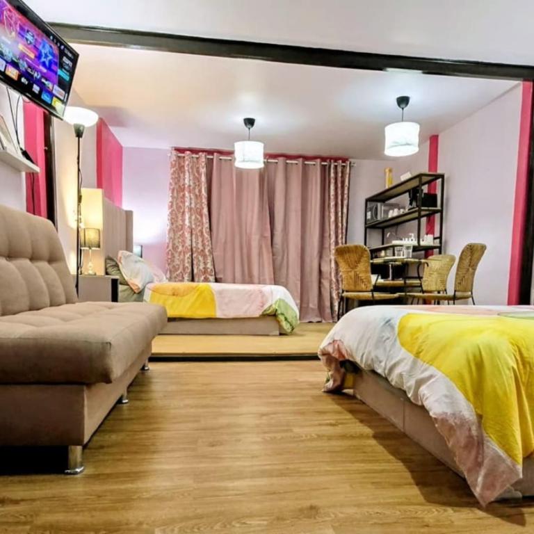 Suite Rosa familiar para hasta 6 huéspedes Amplia, céntrica, con cocineta y baño privado - Vacation Home - 18