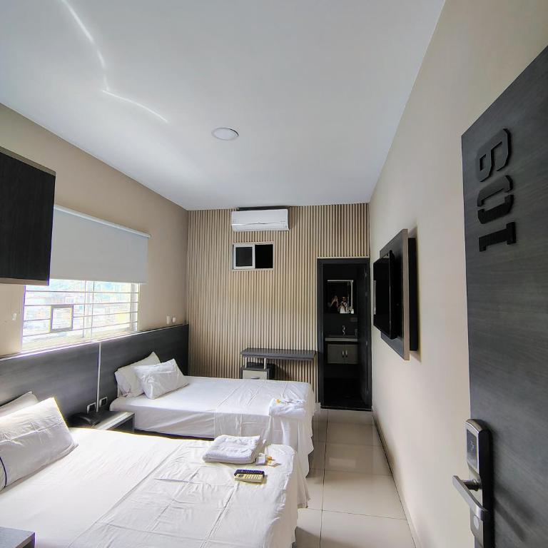 Hotel Doral Inn - Habitación Doble - 2 camas - 4