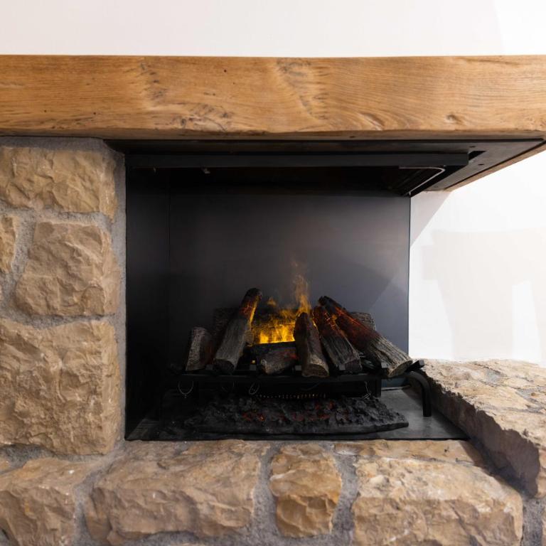 New Premium Studio with eFireplace, Pool & Sauna - Studio mit Balkon - 8