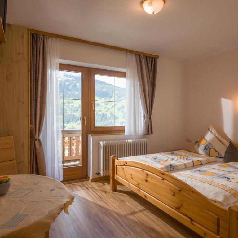 Gästehaus Rahm - Familie Wechselberger - Apartment mit Aussicht und Balkon - 12