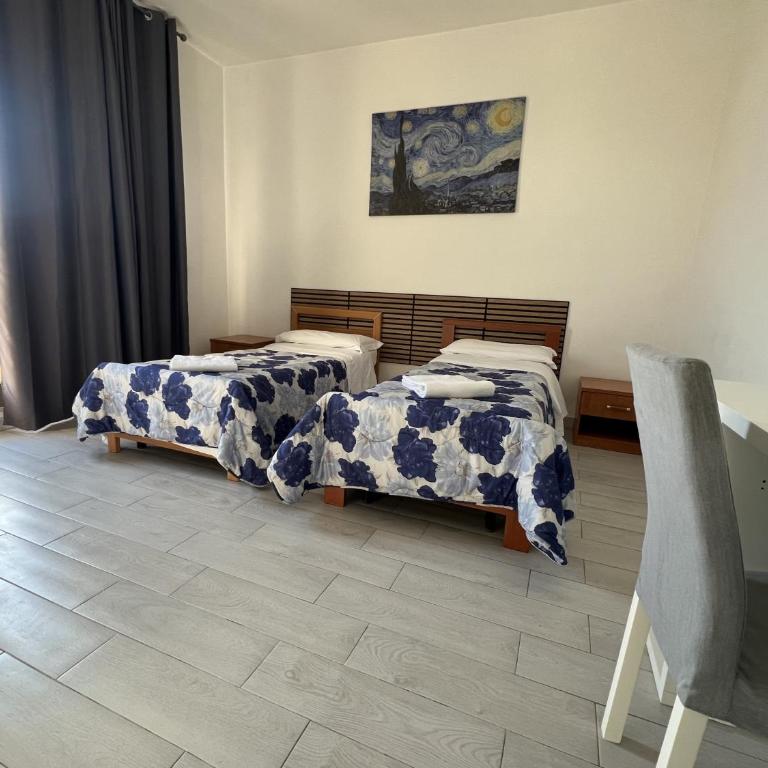 Stephany's Guesthouse - Camera Standard Doppia con Letti Singoli con Bagno in Comune - 8