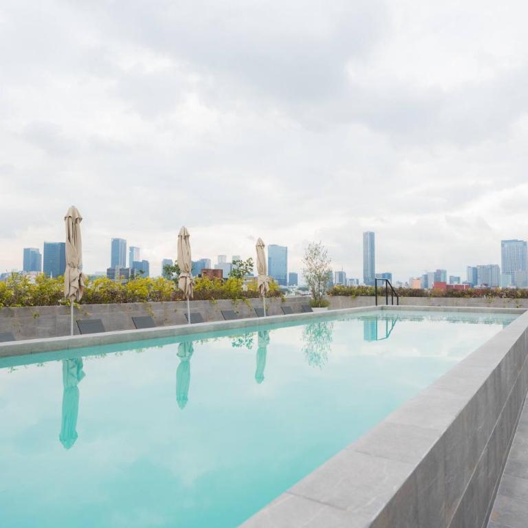 Luxury 2BR with Pool, Gym & Coworking - Two-Bedroom Apartment - 1