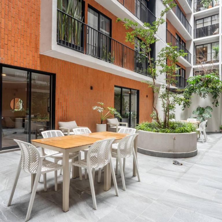 Luxury 2BR with Pool, Gym & Coworking - Two-Bedroom Apartment - 14