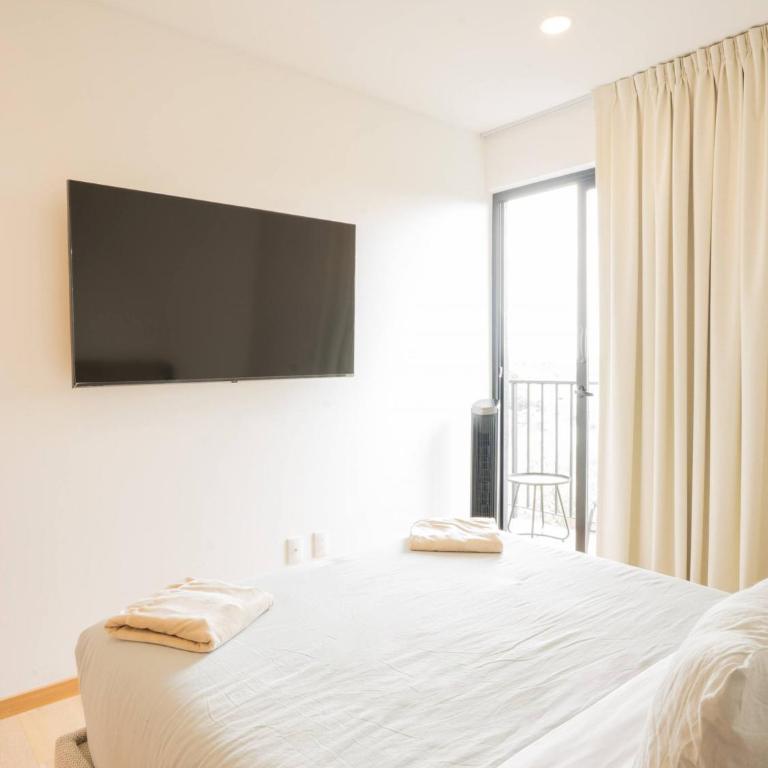 Luxury 2BR with Pool, Gym & Coworking - Two-Bedroom Apartment - 45
