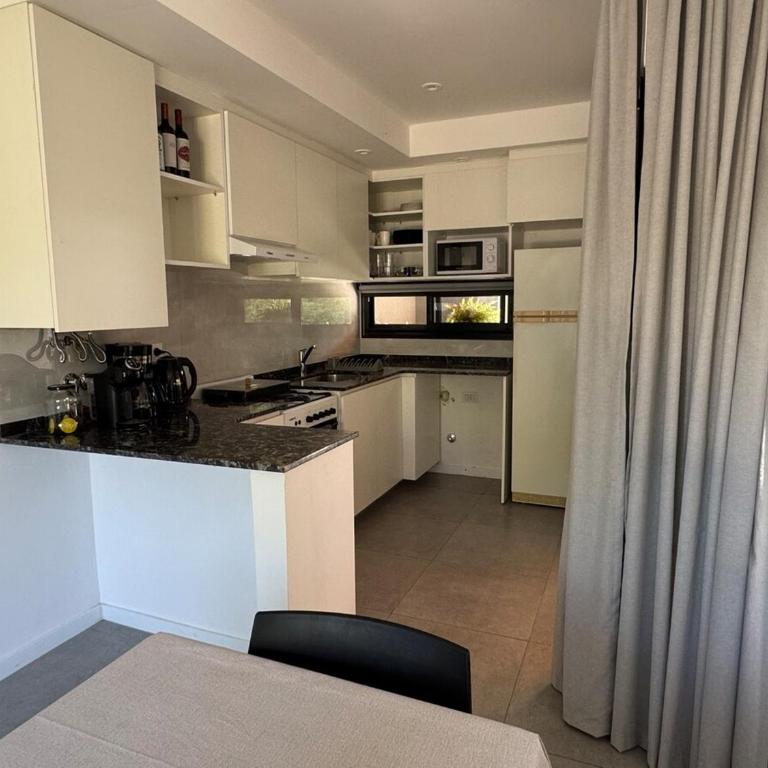 Casa con pileta en Funes - Two-Bedroom House - 14