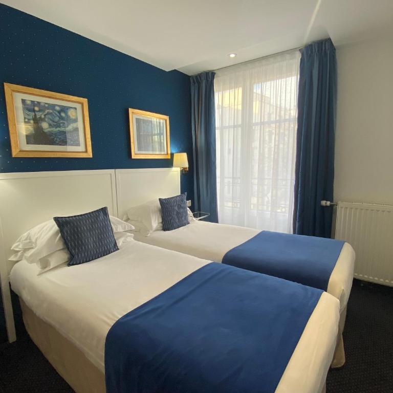 Austin's Saint Lazare Hotel - Chambre Lits Jumeaux - 2