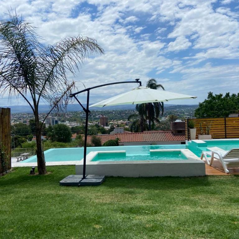 Residencia Premium con Vista Panorámica y Pileta Climatizada - Four-Bedroom House - 56