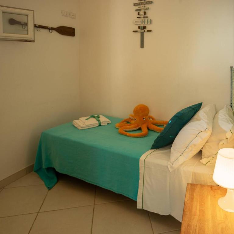 Unda de Ma Apartment with AC & Sea View Balcony - Three-Bedroom Apartment - 15