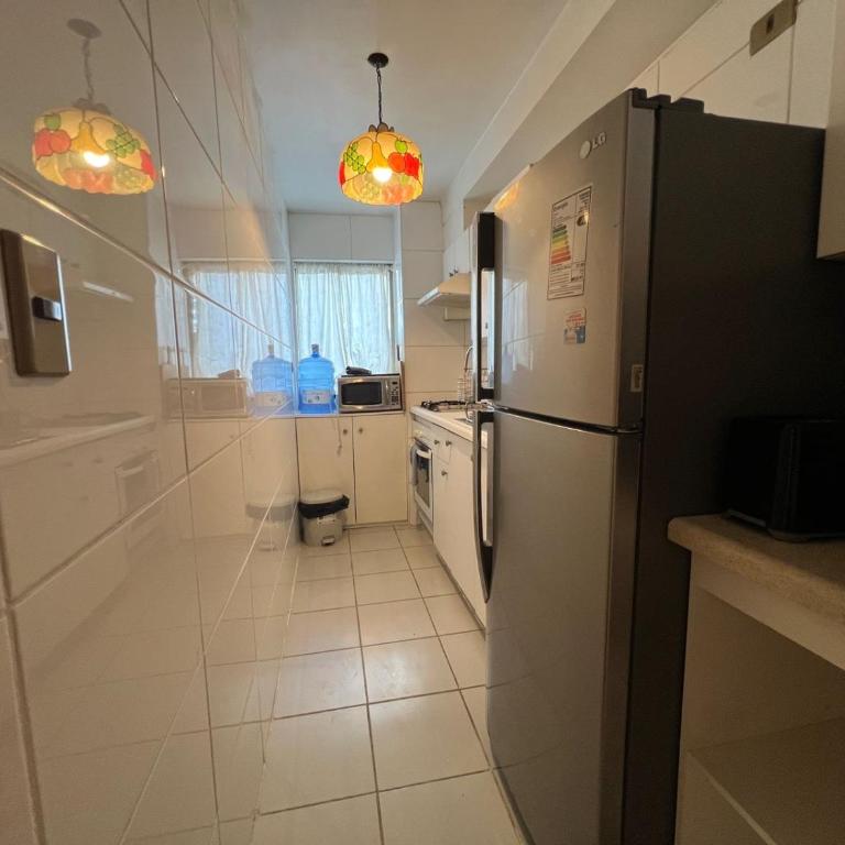 Amplio Departamento en Centro de Concepción con estacionamiento 2D-2B - Apartamento de 2 dormitorios - 11