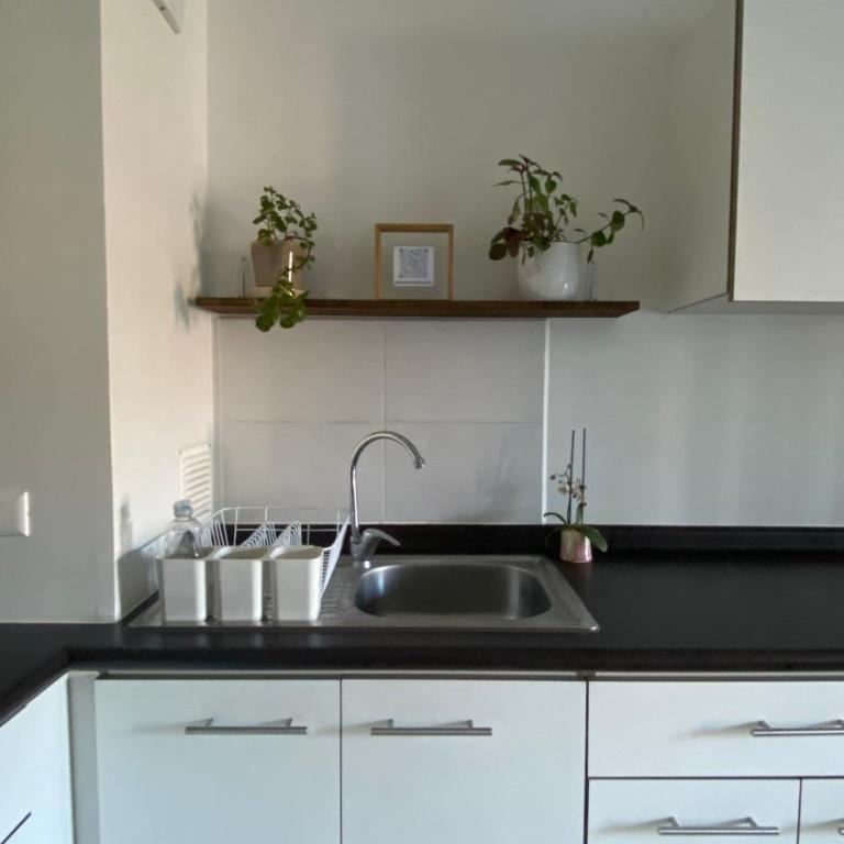 Departamento cómodo con terraza y estacionamiento privado - Apartamento de 2 dormitorios - 10