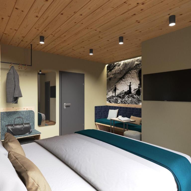 Hotel Alpina - Budget Doppelzimmer mit Balkon und Blick auf das Dorf - 1