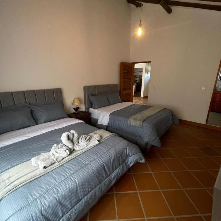 La Estancia Colonial - Three-Bedroom House - 27